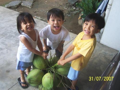 Kids and freshly picked buko